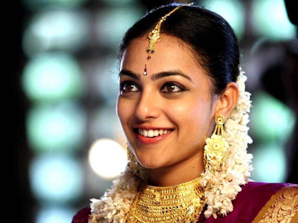 Close Up Face Image Of Nithya Menen