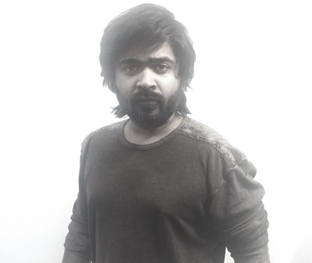 New Hair Style And Black And White Still Of Silambarasan