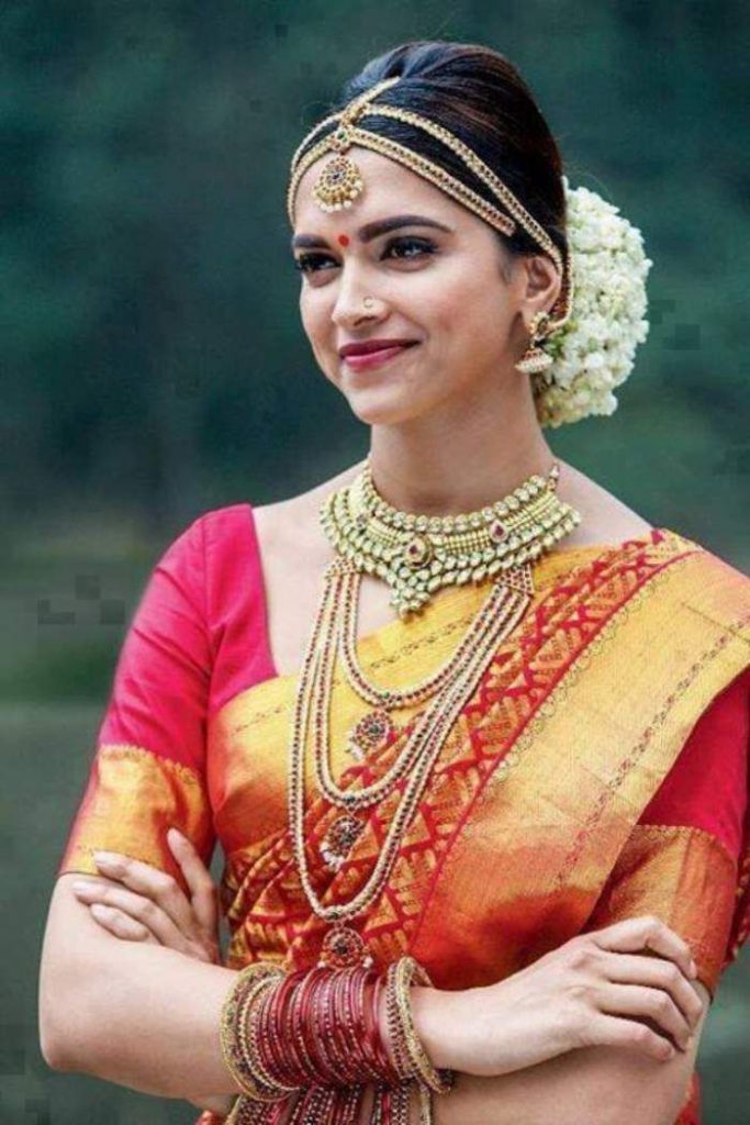 Traditional Look And Cute Smiling Image Of Deepika Padukone