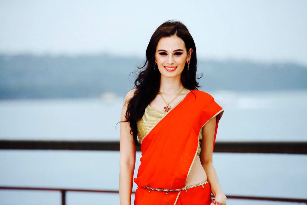 Dazzling Red Saree Pics Of Evelyn Sharma