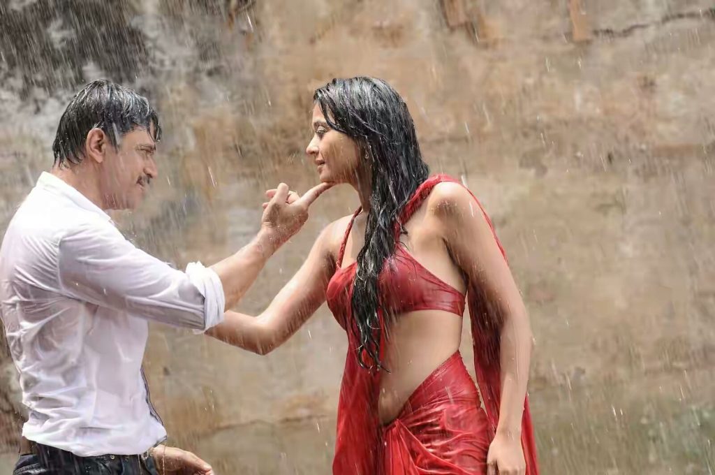 Romantic Stills Of Surveen Chawla And Arjun